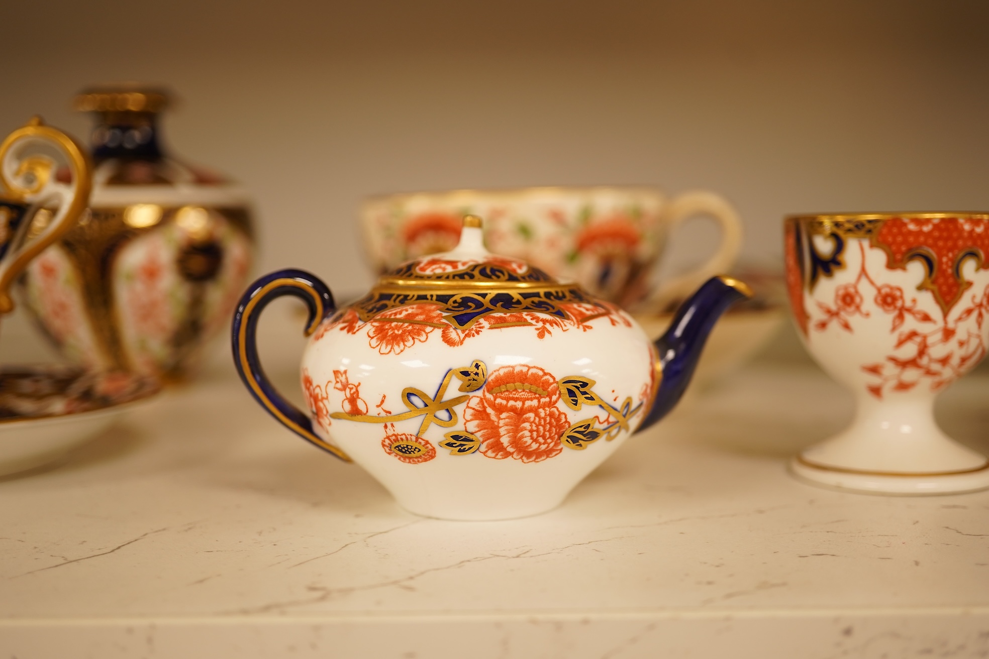Twelve items of various patterns of Royal Crown Derby, largest item 27cm diameter